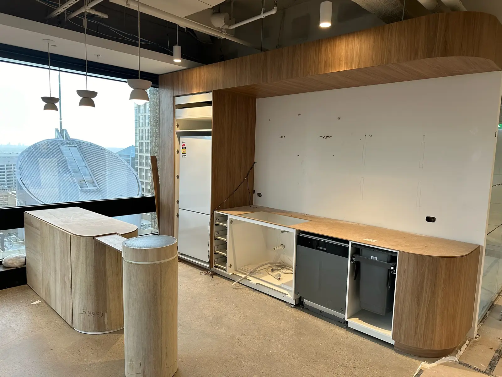 Breakout kitchen joinery mid-installation in a Sydney CBD office tenancy