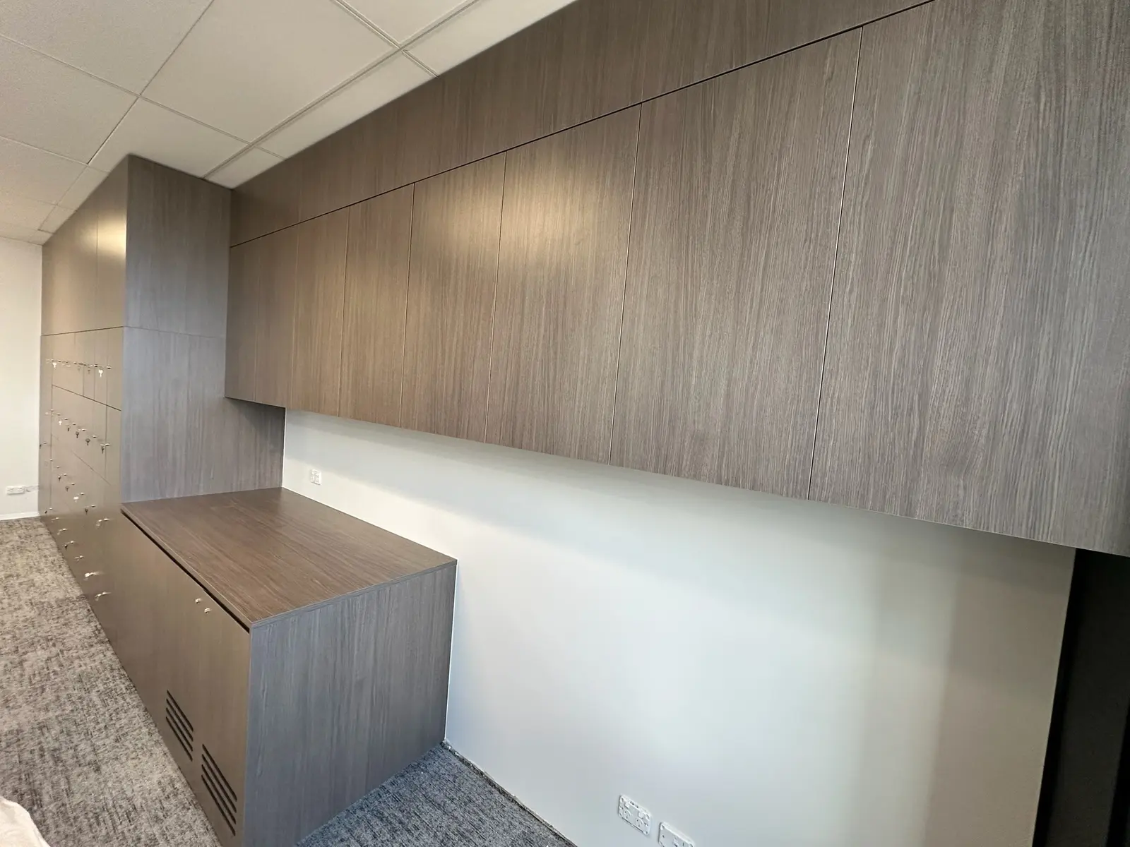 End-of-trip locker wall installed in a Sydney CBD office fitout