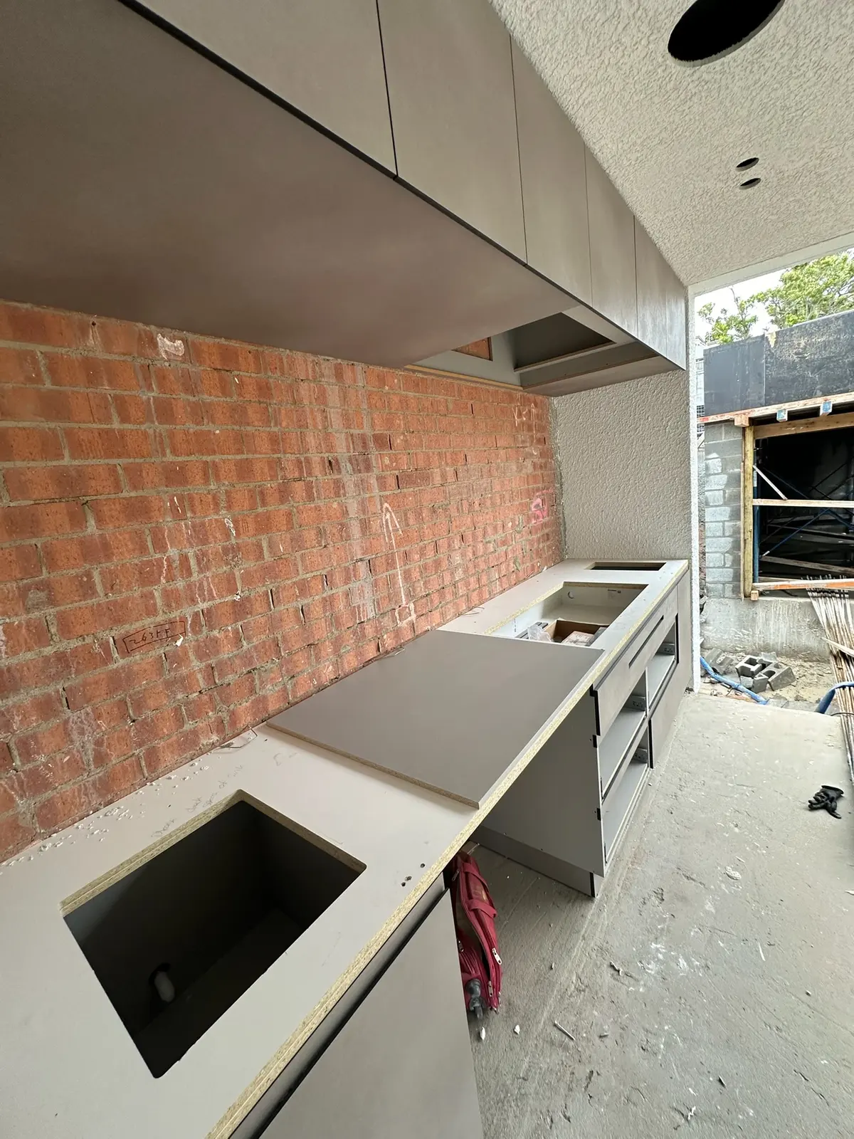 Outdoor alfresco area under construction ahead of custom kitchen cabinetry installation, Sutherland Shire