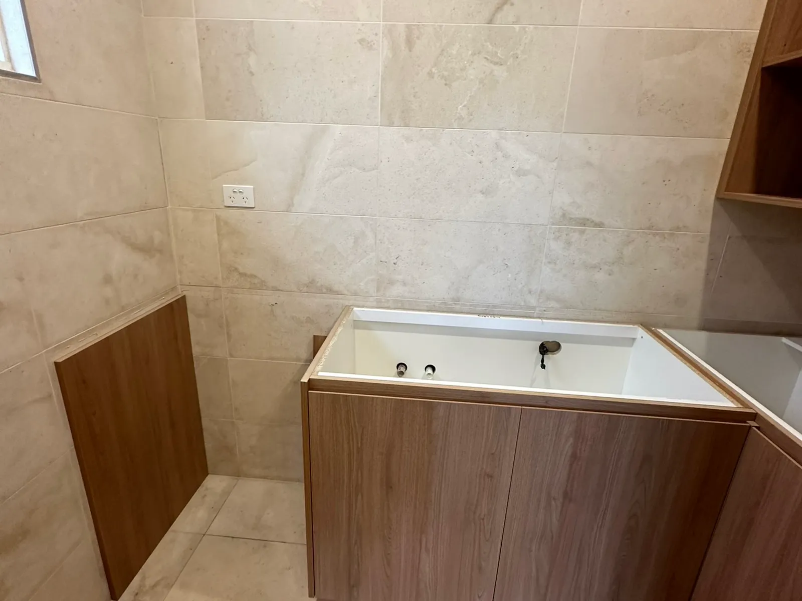 Bathroom vanity cabinetry mid-installation during a Bondi Junction renovation
